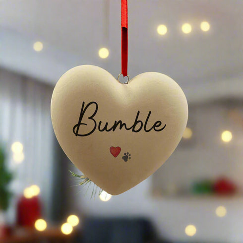 A Personalised Paw Print & Heart Ceramic Heart Bauble